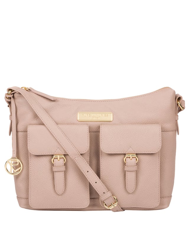 Crafted from leather that has soft pebble grain finish, the 'Jenna' shoulder bag from Pure Luxuries London comes with eye-catching gold-coloured fittings. The zip-over top secures a 100% cotton lined compartment, complemented by two internal pockets along with three external pockets that provide on-the-go storage; two of which are fastened with mock buckle press-studs. Comes with an adjustable matching leather strap and is adorned with the gold-coloured Pure Luxuries London charm and logo.