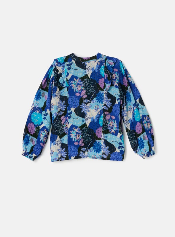 Co-ordinate your style with our scrumptious set. Delicate printed crinkle georgette our pretty blouse looks fabulous paired with her matching skirt but looks equally stunning with denim. About me: 99% Viscose 1% mettalised Fibre Look After Me: Think Planet. Wash At 30C.