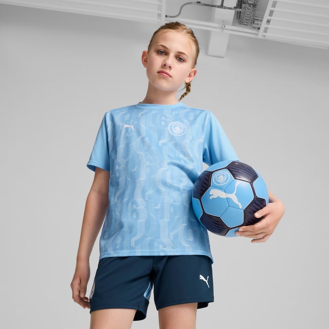 PRODUCT STORY: Train like the champions in this official Manchester City Pre-match Short Sleeve jersey. With a regular-fit, crew neck and our sweat-wicking dryCELL tech, it's tailored for optimal pre-match focus. It features Manchester City details, so you can represent the team with pride. FEATURES & BENEFITS: dryCELL: Performance technology designed to wick moisture from the body and keep you free of sweat during exercise; Made with 100% recycled material excluding trims & decorations. DETAILS: Regular fit; 145 gsm, Jersey; Crew neck; Short sleeves; Official team branding; PUMA Youth: Recommended for older kids between 8 and 16 years.