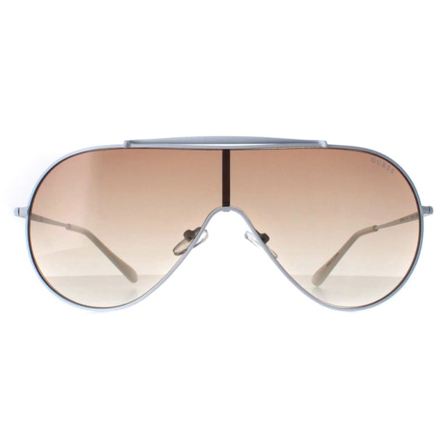 Guess Shield Womens White Brown Gradient GF0370  Sunglasses are a fashionable shield frame shape, exuding a sense of timeless elegance. The frame is crafted from high-quality metal, known for its durability and lightweight feel, ensuring long-lasting comfort throughout the day.