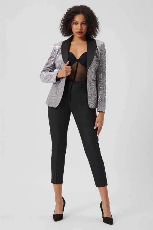 The Swayze skinny fit women's sequin jacket is a twisted take on the classic tuxedo so it's the perfect option if you're ready to party. Featuring contrasting shawl lapels, all over sequins and cut to our signature skinny fit; this women's silver tuxedo jacket is the perfect addition to your partywear rotation.