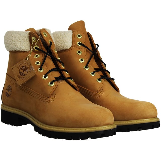 The Timberland 6-Inch Premium Men's Boots are a classic and rugged choice for men who appreciate durable and stylish footwear. Here are the key features of these boots:

 Brown Nubuck Leather:  These boots are typically constructed with premium brown nubuck leather, which is known for its durability and resistance to wear and tear. Nubuck leather provides a soft and velvety texture.

 Classic 6-Inch Height:  The 6-inch height is a signature feature of Timberland boots. It provides ankle support and protection, making them suitable for various outdoor activities.

 Waterproof Construction:  Timberland is renowned for its waterproof boots, and the 6-Inch Premium Boots are no exception. They often feature seam-sealed construction and waterproof leather to keep your feet dry in wet conditions.

 Padded Collar and Tongue:  These boots come with a padded collar and tongue for enhanced comfort and to reduce the risk of chafing or discomfort during extended wear.

 Lace-Up Closure:  The boots typically feature a lace-up closure system with rustproof hardware, allowing for a secure and customized fit and ensuring durability over time.

 Anti-Fatigue Technology:  Some Timberland boots, including the 6-Inch Premium line, feature anti-fatigue technology in the midsole. This technology provides all-day comfort and support, especially during long walks or hikes.

 Rubber Lug Outsole:  The rugged rubber lug outsole offers excellent traction and grip on various surfaces, making these boots suitable for outdoor adventures.

 Versatile Use:  While originally designed for outdoor and workwear, these boots have become a fashion statement and can be worn in various casual and urban settings.

 Timberland Branding:  These boots feature Timberland branding details, such as the iconic Timberland tree logo on the side and embossed branding on the tongue, representing the brand's reputation for quality and style.

In summary, the Timberland 6-Inch Premium Men's Boots are a durable and stylish choice for men who want both fashion and function in their footwear. With their waterproof construction, comfortable features, and iconic design, they are a versatile addition to your wardrobe, suitable for both outdoor activities and everyday wear. These boots are a classic symbol of Timberland's commitment to quality and rugged style.