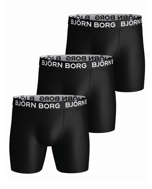Björn Borg - Men’s 3 Pack Performance BoxersBjörn Borg Men’s Boxers are the perfect solution for your underwear drawer. They have been designed with performance and sport in mind and have a great fit that will keep you comfortable throughout the day.These high performance underwear with the perfect fit are developed for training. They are made from soft stretch quality fabric treated with Hydro Pro functionality that wicks moisture away from the skin to keep you dry. With smooth seams and elastic to avoid chafing, and an iconic signature elastic waistband in soft microfiber for extra comfort. They are made from 90% Recycled Polyester, which keeps them soft and stretchy.The medium leg length makes these Björn Borg boxers ideal for whatever sport or activity you get up to, while still giving you enough coverage to look stylish when you’re training in the gym or on the pitch.These boxers are perfect for both work and play, making them an ideal choice for topping up that underwear drawer. They come in 2 colour options which are: All Black or Black Khaki mix.These boxers are made from: 90% Polyester (Recycled), 10% Elastane and come in 4 sizes: Small, Medium, Large & X-Large. They come in 3 pairs per pack, making them great value for money and they are Machine Washable.Extra Product DetailsBjörn Borg Men’s BoxersSuitable For Sport3 Pairs Per PackPerformance FItGreat Value For MoneyMedium Leg LengthMid Waist RiseSoft Elasticated WaistbandMoisture Wicking2 Colour Options90% Recycled PolyesterAvailable in: S, M, L & XLMachine Washable