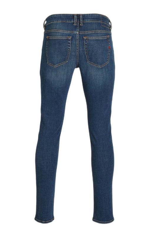 Mens Diesel Sleenker Skinny Jeans in denim.- 5-pocket construction. - Zip fly and button fastening.- Six belt loops on the waistband.- Detailed with iconic Diesel Industry branding on coin pocket.- Branded strip across small pocket.- Skinny fit. - 98% Cotton  2% Elastane.- Ref: A0359409E9501