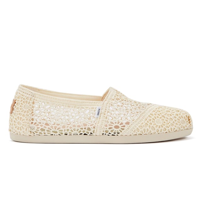 Experience ultimate comfort and style with our exquisite crochet uppers, complemented by the cutting-edge TOMS CloudBound Sole. Crafted to provide exceptional comfort, cushioning, and traction, these shoes are a true delight for your feet. The textile upper is not only trendy but also 100% vegan, making it a perfect choice for conscious consumers. With a removable insole and elastic gore for effortless on-and-off, these shoes are designed to enhance your convenience. Step into a world of comfort and sustainability with our remarkable footwear.