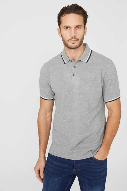 Introducing our Pique Tipped Polo, the perfect addition to any man's smart casual wardrobe. Crafted with meticulous attention to detail, this polo offers a sophisticated and polished look. The pique fabric provides a comfortable and breathable feel, making it ideal for all-day wear. With its stylish tipped collar and cuffs, this polo adds a touch of elegance to any outfit. Whether you're heading to the office or out for a casual gathering, our Pique Tipped Polo is the ultimate choice for a smart and effortlessly stylish look.