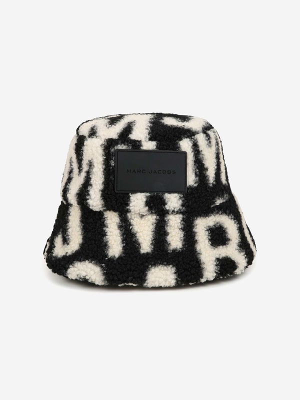 Introducing the Kids Faux Shearling Bucket Hat in Black by marc_jacobs, essential for AW2024. This chic accessory promises style and warmth for both boys and girls. Discover its standout features:‚ Luxurious Faux Shearliner: Offers a plush feel and maximum warmth.‚ Signature Black: Versatile and classic, complements any outfit.‚ Designer Craftsmanship: marc_jacobs's attention to detail ensures durability.Elevate your child's wardrobe with this stylish piece. Shop now to add a touch of elegance to their cool-weather look!