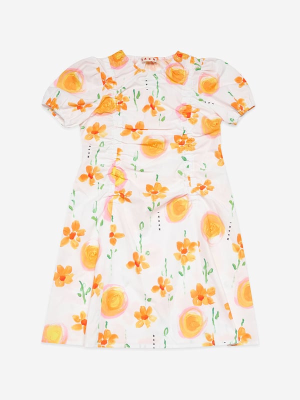 Marni portray dreamy, otherworldly designs in their beautiful handcrafted aesthetics. This girls white poplin dress is a piece to be everlastingly loved. Crafted in high quality cotton with all-over marigold print and orange suns. It showcases balloon sleeves and delicate gathered details.   100% Cotton
