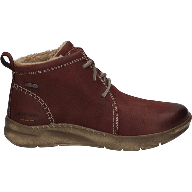 Gefertigt ist unsere Stiefelette aus langlebigem Nubuk-Leder, was dem Schuh eine besonders angenehme Haptik gibt. Diese Stiefelette ist für den Herbst mit hochwertigem Textil warm gefüttert. Die praktische Schnürung gibt dem Fuß beim Gehen und Stehen viel Halt. Die TopDryTex-Membran bietet zugleich warme als auch trockene Füße. Unser Modell hat eine herausnehmbare Sohle damit Du gegebenenfalls Deine eigenen Einlegesohlen nutzen kannst. Die Machart Strobel wird normalerweise für Sneaker verwendet weshalb sie den Schuh besonders leicht macht. Weite G ist die Komfortweite für alle normal gebauten Füße. Das alltagstaugliche Modell Conny 56 gibt Dir die Freiheit – Deinen Weg zu gehen.