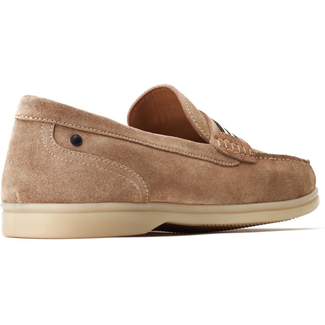 Base London Drum Leather Men's Sand Loafers The Drum loafer from Base London is your casual summer staple. The soft suede uppers and Ortholite insole provide a comfy ride while the detailing on the nylon strap across the vamp elevates this style and gives it character.