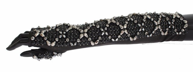 Gorgeous brand new with tags
  100% Authentic Dolce & Gabbana black leather
  Finger-free design
  Elbow length
  Black color with black and silver crystal beads
  Logo details
  Limited edition
  Made in Italy
Material: 100% Leather
