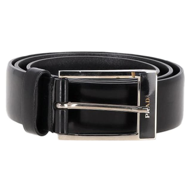 VINTAGE, RRP AS NEW
Add a touch of luxury to your accessories collection with the Prada Logo Buckled Belt in black leather. Crafted from premium leather, this sleek belt features a polished logo-embossed buckle that subtly showcases the brand’s iconic design. The timeless black hue makes it a versatile addition, effortlessly complementing both casual and formal outfits. Whether worn at the waist or hips, this belt adds structure and sophistication to any look, offering a refined finishing touch to dresses, trousers, or skirts. With its exceptional craftsmanship and minimalist elegance, the Prada Logo Buckled Belt is an essential wardrobe accessory for those who appreciate understated luxury.

 Prada Logo Buckled Belt in Black Leather

Condition: Excellent
Signs of wear:  No sign of wear.
Packaging: None
Color: Black
Material: Leather | leather
Size: One Size | One Size
Measurements: Width: 35; Length: 980
SKU: NAPPUGBAC446379W