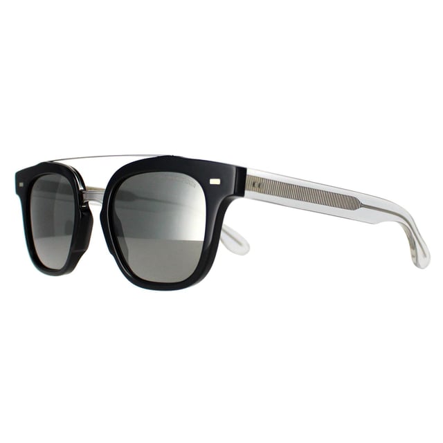Cutler and Gross Round Mens Silver Black Crystal Grey 1297  Sunglasses are a harmonious blend of luxury and functionality. The distinctive oversized round frames exude elegance and confidence, while the high quality Italian acetate ensures durability and comfort. Whether lounging by the beach or strolling through the city, these sunglasses elevate your look with unparalleled refinement and undeniable allure.