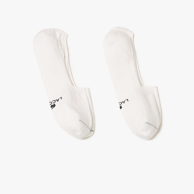 Unisex Organic Cotton Jersey No-Show Socks.- No-show cut:, For sneakers or dress shoes.- Crocodile print under sole:, The Lacoste insignia, everywhere you go.- Organic cotton jersey: So both the planet and your feet can breathe. Material: 100% Cotton. Ref: RA2741001.
