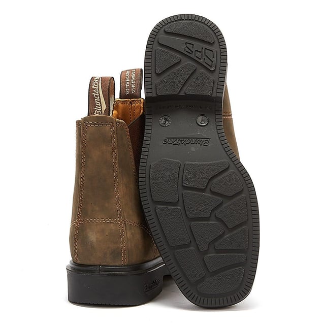 Blundstone's versatile Dress boots embody a chisel-toe Chelsea boot silhouette that can be dressed up or down to suit any occasion. The #1308 features timeless rustic brown leather  versatile and effortless. SPS (Shock Protection System) offers heightened shock absorption so your feet will be supported all-day long.
