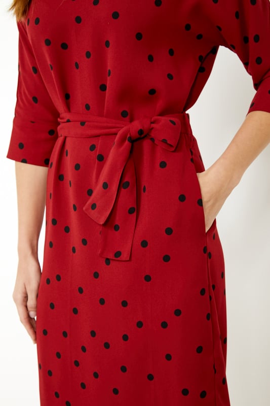 REASONS TO BUY: 

Spots and shift dresses: always in style
Flattering body-skimming fit and 3/4 length sleeves
Tie belt to show off your waist
Pockets, because who doesn't love pockets?
Keep it classic with black court shoes.