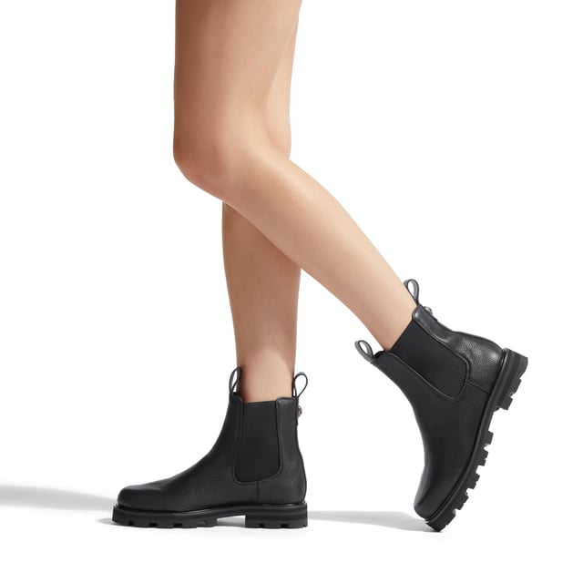 The Kurt Geiger Carnaby Chelsea Boot features a black leather upper. There are two pull tabs at the top of the ankle and elasticated panels for comfort. Sole height: 3cm.