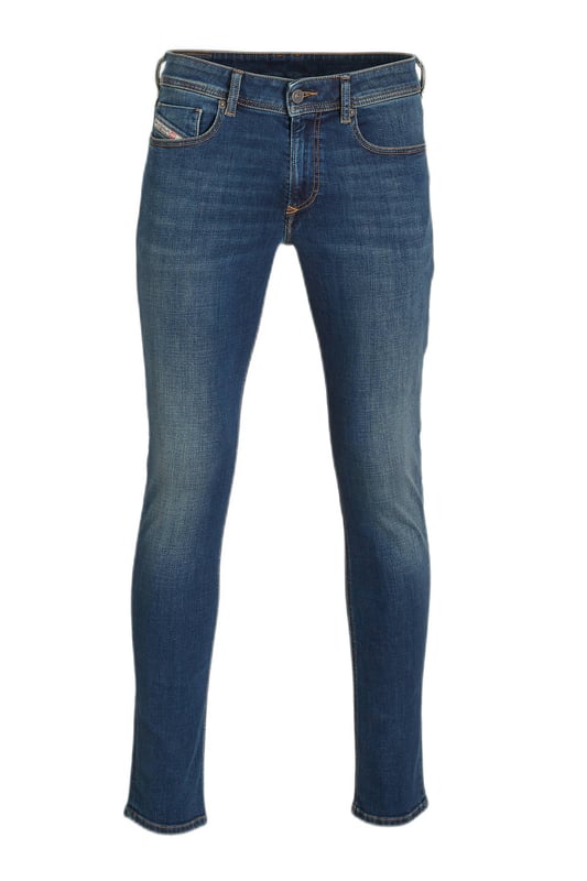 Mens Diesel Sleenker Skinny Jeans in denim.- 5-pocket construction. - Zip fly and button fastening.- Six belt loops on the waistband.- Detailed with iconic Diesel Industry branding on coin pocket.- Branded strip across small pocket.- Skinny fit. - 98% Cotton  2% Elastane.- Ref: A0359409E9501