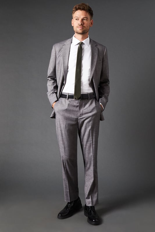 Tailored fit for a refined silhouette
        Sharkskin texture adds subtle sophistication
        Belt loops for versatile styling options
        Side pockets for practicality
        Pressed centre creases for a crisp look
    
    These mid grey sharkskin trousers offer a perfect balance of style and comfort, ideal for the modern gentleman who appreciates classic tailoring. The tailored fit sculpts your silhouette while allowing ease of movement, making them suitable for long days at the office or evening events. Pair them with a crisp white shirt and matching jacket for a complete suit look, or dress them down with a light jumper for smart-casual occasions. The versatile mid-grey hue allows for effortless coordination with various shirt colours and accessories. Whether you're heading to an important business meeting, a wedding, or a sophisticated dinner, these trousers will ensure you look polished and feel confident. Their timeless design makes them a wardrobe staple that will serve you well for years to come.