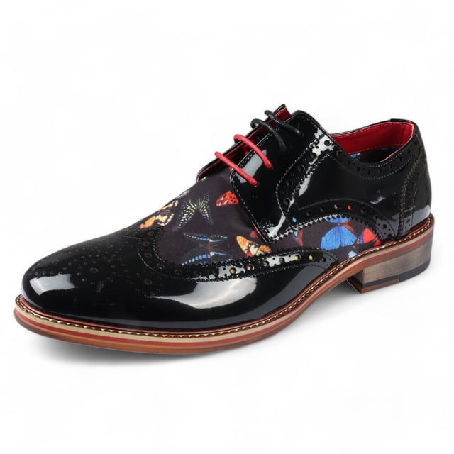 Step up your formal style with the Justin Reess Julius Men's Butterfly Print Patent Leather Brogue Shoes. These shoes feature a striking butterfly print on premium patent leather, adding unique flair to any formal outfit. With classic brogue detailing along the toe cap and edges, combined with a polished lace-up design, these shoes offer a sophisticated and timeless look. Ideal for weddings, business meetings, and special occasions, they bring elegance and personality to your wardrobe.

Unique Butterfly Print for standout style
High-Quality Patent Leather for a sleek, polished look
Classic Brogue Detailing for added sophistication
Versatile Formal Wear perfect for any formal event