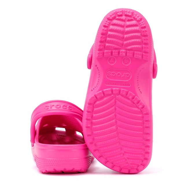 Introducing these comfortable and stylish clogs that are made of Croslite material, which is a lightweight and durable foam resin that provides cushioning and support for your feet. The clog also features a slip-on design with a backstrap that can be adjusted for a secure fit. The outsole of the clog is made of a non-marking rubber material that provides excellent traction and grip on a variety of surfaces.