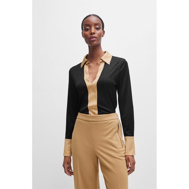 Boss Elanty Ribbed Long-Sleeve Blouse with Johnny Collar in black.- Long sleeves.- Button cuffs.- Stretch material with contrast trims.- Slim fit.- 93% Viscose  5% Polyamide  2% Elastane.  Machine washable.- Ref: 50505794001