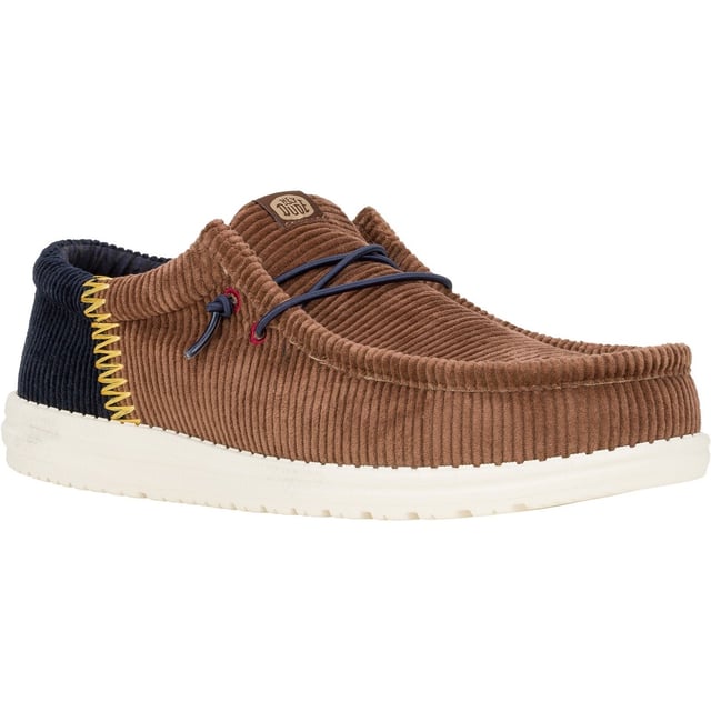 Wally Funk Corduroy brings campus cool and workday style together. Corduroy upper, twill lining and fun colorblock stitching at the heel. Made for busy days or transitioning from work to play.