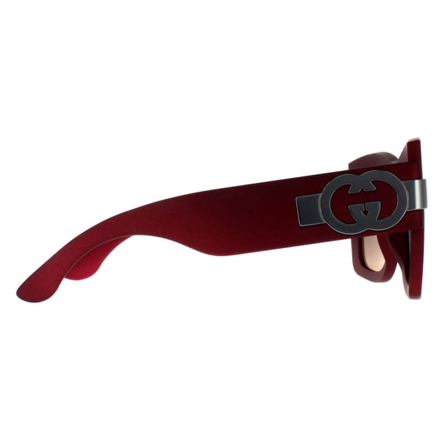 Gucci Square Womens Red with Silver Grey with Light Silver Mirror GG1688S  Sunglasses offer a perfect combination of modern sophistication and understated luxury. With their bold, square frame, these sunglasses make a striking fashion statement while maintaining a timeless appeal suitable for various occasions. The design is complemented by Gucciâ€™s signature double-G logo on the temples, adding a touch of iconic branding that speaks to the wearerâ€™s impeccable taste. High-quality lenses provide essential UV protection, ensuring comfort and safety without compromising on elegance.