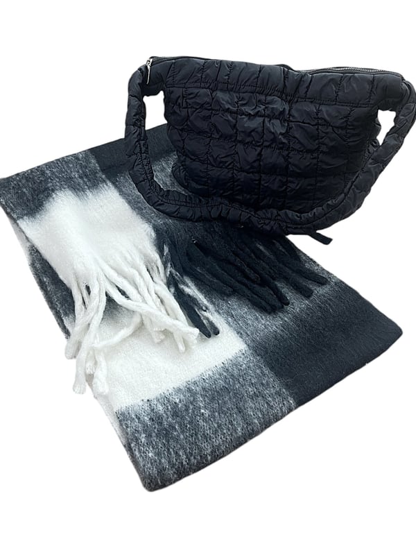 Stay warm and stylish this winter with the Chunky Black and White Check Scarf Bag Everyday Essential Bundle by SVNX. This statement accessory features a bold black and white check pattern with a cozy, chunky knit. Perfect for adding a touch of modern style and warmth to your winter outfits, this scarf effortlessly combines fashion and function. A matching bag to go with the Scarf making your outfits even easier. Perfect for gifting or getting yourself a matching set. Bag Colour: Black. Material: 100% Polyester. Bag Size: W - 45cm H - 35cm. Bag Care: Wipe Clean Only. Bag SKU: HB326202. Unisex Chunky Scarf in Black and White Check. Scarf: One Size. 100% Polyester. Wash at 30. Scarf SKU: SC2303902. Bundle SKU: BD2400101