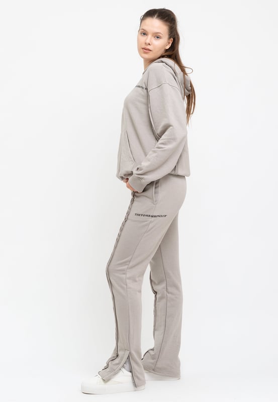 Tom Barron Dames trainingspak met kwart rits en logo in oversize