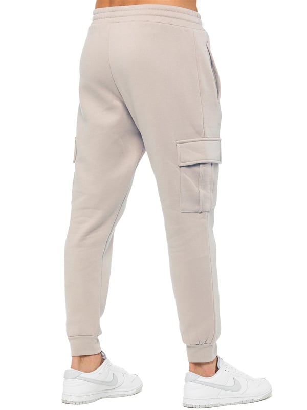 Enzo Mens Overhead Hoodie Tracksuit Set. Regular Fit, Long Sleeve Hoodie with Cuffed Wrists and Adjustable Drawstrings. Features EZ Logo On Chest And Joggers. Regular Fit Cargo Jogger. Elasticated Waistband With Adjustable Drawstring. Features 2 Side Slash Pockets, 2 Cargo Pockets, Single Welt Back Pocket. Ideal to use for Casual and Work wear.