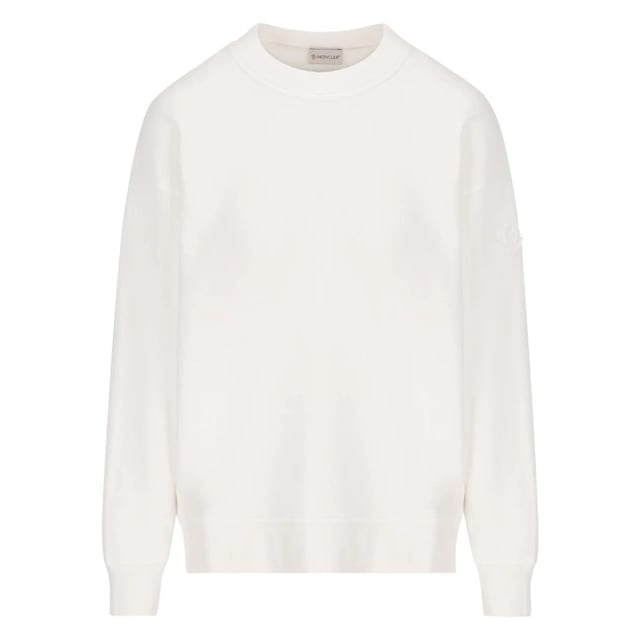 Moncler Detailed Logo On Back White Sweatshirt Moncler Detailed Logo On Back White Sweatshirt. Moncler Branded Logo White Jumper. Elevate your style with the Moncler White jumper. These comfortable Moncler White sweatshirt offer a sleek and versatile look, perfect for any occasion these jumpers provide both style and functionality. Upgrade your wardrobe today. Moncler Branding. Regular Fit, Fits True To Size. Ribbed Sleeve and Waist Endings, 100% Cotton. 8G00031809KX 034