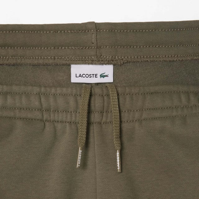 Kids’ Lacoste Organic Cotton and Recycled Polyester Track Pants Elasticated waistband Contrast bands Branding on side Embroidered crocodile Organic cotton flannel Kids’ Lacoste Organic Cotton and Recycled Polyester Track Pants Elasticated waistband Contrast bands Branding on side Embroidered crocodile Organic cotton flannel