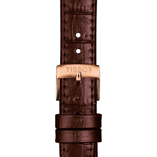 This Tissot Carson Premium Analogue Watch for Women is the perfect timepiece to wear or to gift. It's Rose Gold 30 mm Round case combined with the comfortable Brown Leather watch band will ensure you enjoy this stunning timepiece without any compromise. Operated by a high quality Automatic movement and water resistant to 5 bars, your watch will keep ticking. This high quality watch has an automatic watch movement ( recharged by any movement with your wrist; never needs a battery) - This Analogue watch has a calendar function: Date, Swiss Made High quality 19 cm length and 15 mm width a Brown Leather strap with a Buckle Case diameter: 30 mm,case thickness: 10 mm, case colour: Rose Gold and dial colour: Silver