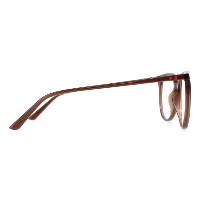 Calvin Klein Round Womens Milky Brown CK19508  Glasses are a stylish and bold accessory that will make a statement with any outfit. These glasses feature a unique and contemporary design, with a sleek round frame that is both eye-catching and fashionable. The frame is made from high-quality acetate that is lightweight and durable, ensuring long-lasting wear and comfort.