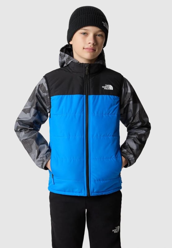 The Never Stop Insulated Gilet is the go-to choice for young explorers. Size XL - 14/16 Years,  Size 2XL- 18/20 Years. Packed with lightweight yet exceptionally warm synthetic insulation, it ensures warmth and comfort throughout every adventure. - -. The gilet's fabric is coated with a durable water-repellent finish, providing protection against light showers and keeping outdoor exploration enjoyable even in damp conditions. - -.  Versatile and practical, it is 3-in-1 compatible with yellow-label outer jackets from The North Face. - -. The gilet is equipped with two convenient zipped hand pockets and a reflective bar on the back hem, enhancing visibility and safety during outdoor activities. Stay warm, dry, and visible with The Never Stop Insulated Gilet on your side. - -. Body: 100% Recycled Polyester, Lining: 100% Recycled Polyester