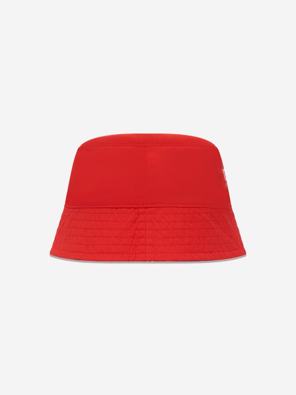 Introduce the Girls Reversible Bucket Hat in Blue by Kenzo, an essential addition to your little one's summer wardrobe. Let's highlight the must-known features:  Chic Design: Trendy print renders this hat a charming and fashionable accessory, perfect to top off any outfit.  Comfort Supreme: Crafted from premium materials, the hat provides unmatched comfort for your girl's daily escapades.  Versatile Wardrobe Update: This Reversible Bucket Hat is a vibrant accent, promising to significantly uplift your Girls style quotient. Secure one now and let her flaunt it with flair!