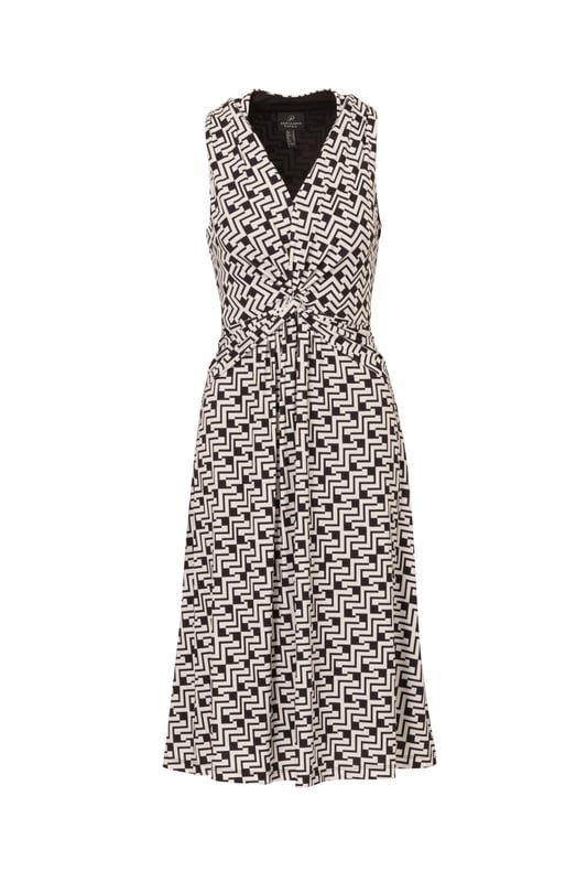 Great for work and for play, this sleeveless dress is a timeless look. This midi dress features a fitted bodice with a v-neckline, a knotted detail at the centre of the waist, and a soft skirt. Crafted from jersey fabric with comfortable stretch, this pull-on day dress boasts a geometric print. Styled with a blazer at the office, this sleeveless dress will take you all the way through happy hour.