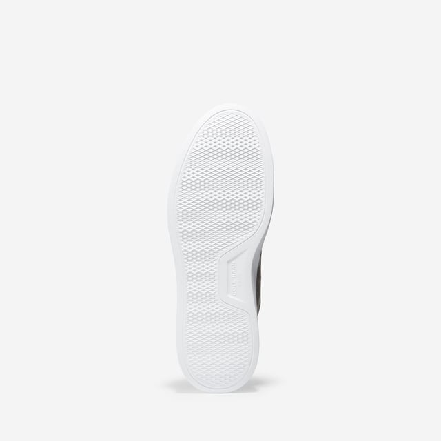 We've given our much-loved, signature GrandPro Rally Court Sneaker an update in organic canvas. Crafted from high-end-yet-durable materials, it features a luxuriously cushioned GRANDFOAM footbed, an EVA outsole, and a classic old-school sneaker vibe