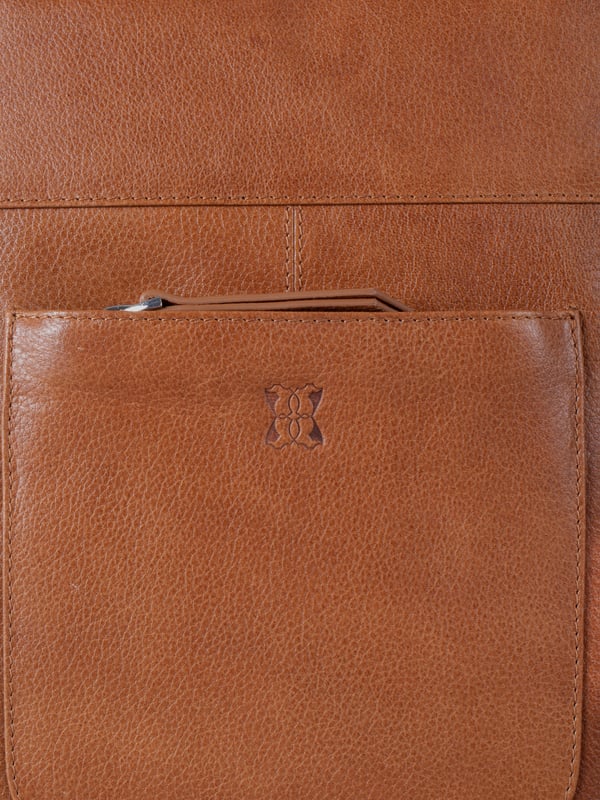 The Talkin handbag collection is a study in sleek sophistication, and this practical backpack is no exception. Crafted from soft premium leather, this classic style has plenty of space to ensure you can carry all your essentials with ease. The adjustable leather straps offer unparalleled comfort, and we've included a grab handle for convenient carrying.