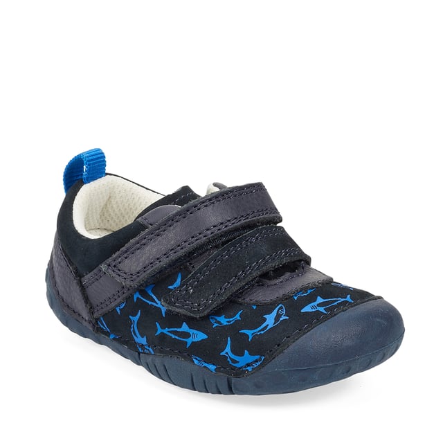 A fin-tastic casual style pre-walker, specifically designed for tiny toes and chubby feet. Little Fin is crafted from a soft navy nubuck with an adorable shark print. Heel and toe bumpers protect little feet and ultra-flexible lightweight soles give unrestricted movement and barefoot comfort. There's a double rip-tape fastening for a snug fit and easy adjustment.