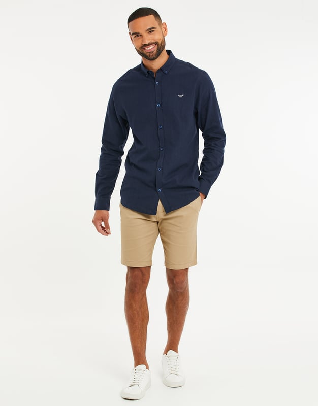 Add style to your outfit with this lightweight cotton-linen blend shirt from Threadbare. It is designed in a regular fit and features a button-down collar, long sleeves, and a brand logo on the chest. Available in other colours.