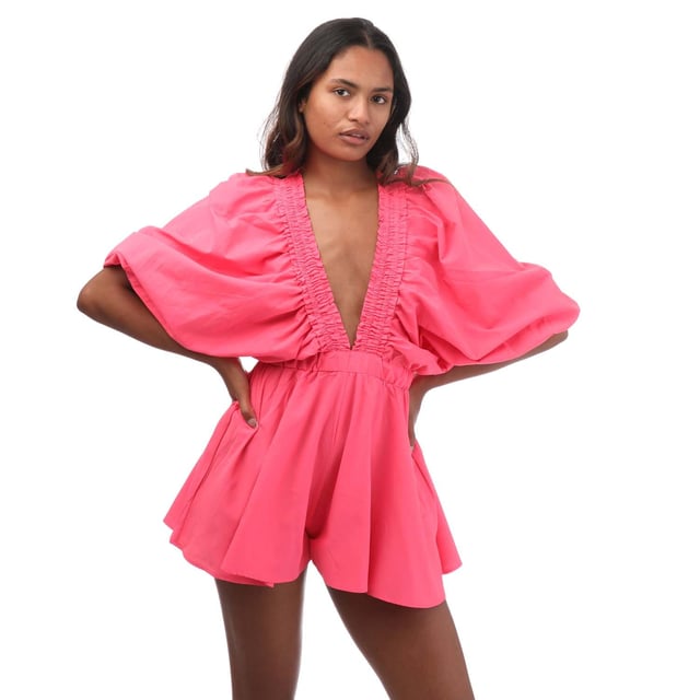 Women's Sundress Alicia Jumpsuit in Cerise.- V neckline with delicate gathers on an elastic band.- Kimono sleeves, fashionably tightened at the cuffs.- Adjustable elastic waistband.- Flattering fit.- 55% Cotton, 45% Polyester. Ref: S24005CER.