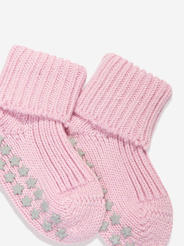 German apparel brand FALKE incorporate superior engineering into their flawless constructions. These baby girls cotton catspads are made in the finest eco-friendly material. They are adorned with supportive silicon nubs on the sole via the softest texture to support learning to crawl and walk. ‚ Optimal Durability‚ FALKE Perfect Fit‚ 96% Cotton, 2% Polyamide, 2%  Elastane
