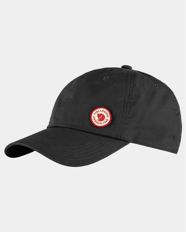 Fjällräven Logo Cap
When the sun is beating down, this cap will provide you with welcome shade and help you keep your cool. Made from G-1000 Lite in recycled polyester and organic cotton, it is lightweight and breathable in hot weather. Plain and simple with a small 1960 logo on the left front – the year that Fjällräven was founded. 

Comfortable cap in light and airy G-1000 Lite.
Made from recycled polyester and organic cotton.
Lightweight and breathable with embroidered ventilation holes.
Adjustable with a metal clasp at the back.
1960 logo on the left front.
Durable
hand wash
do not dry clean
do not tumble dry
do not bleach
do not iron
wash separately
G-1000® Lite: 65% polyester (recycled), 35% cotton (organic)

F13100181
