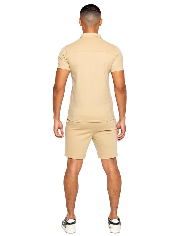 Enzo Mens Collared Polo Tracksuit Set. Collared, ¼ Zip, Short Sleeve Polo. Stitched Trims At Sleeve & Hem. Stretch Fabric For Extra Comfort. Finished with Stretch Shorts. 2 Side Pockets, 2 Back Welt Pockets. Elasticated Waistband With Adjustable Drawstring. Front Pin Tuck Seam