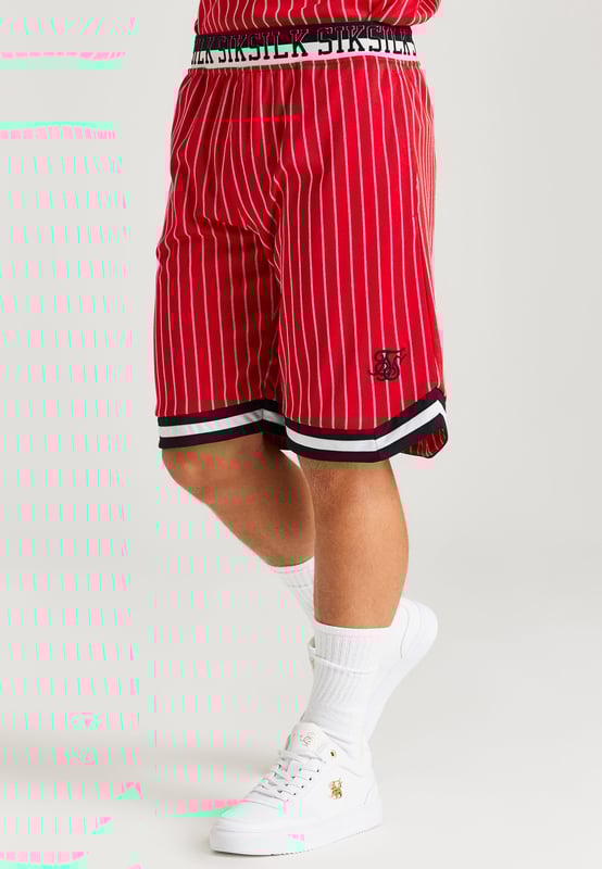 inchSikSilk Retro Classic Basketball Shorts  RedRegular fitSoft touch fabricEmbroided SikSilk logoSikSilk branded elasticated taped waistSide slant pocketsContrast leg hem tapingMachine wash95% Polyester 5% Elastane inch