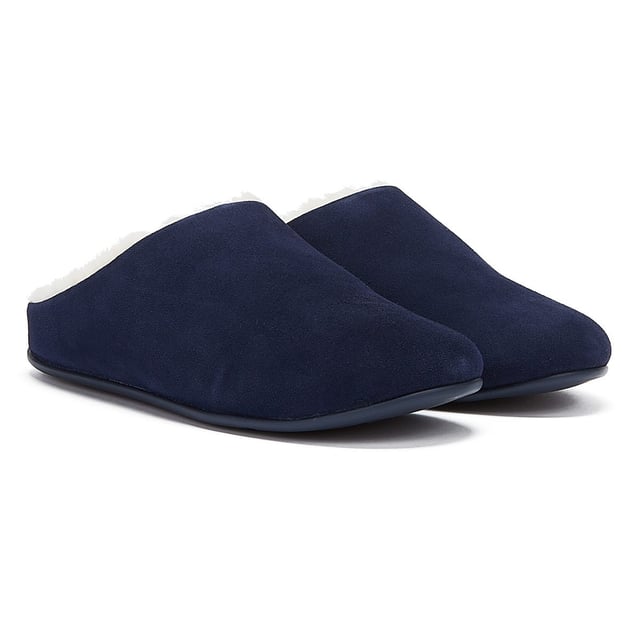 FitFlop Chrissie Shearling Womens Slippers Made for lounging in style the suede version of the Chrissie offers a cosy ultra-soft shearling lining whilst ergonomic iQushion technology provides an ultra comfortable experience. This trademark technology includes feather-light flexible air-foam midsoles with a softly-padded contoured footbed.