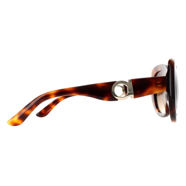 Salvatore Ferragamo Oval Womens Tortoise Brown Gradient Sunglasses SF727S are a modern oval style crafted from lightweight acetate. The Salvatore Ferragamo logo features on the temples for brand authenticity