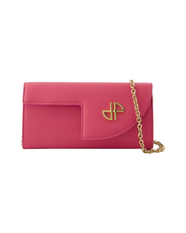Shoulder strap : 58 cm. Worn crossbody - one shoulder chain. Material : smooth calfskin. Colours: PINK - PINK. Fit: true to size - Sizing: European. Closure : flap with magnetic clasp. Interior : One zipped pocket, one flat pocket. width: 40mm, length: 210mm, height: 110mm